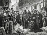 7898719_Martin_Luther_1483_1546_Publicly_Burning_The_Pope's_Bull_In_1521