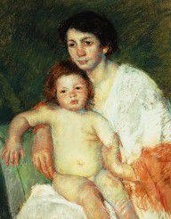 17972839_Nude_Baby_On_Mother's_Lap_Resting_Her_Right_Arm_On_The_Back_Of_The_Chair