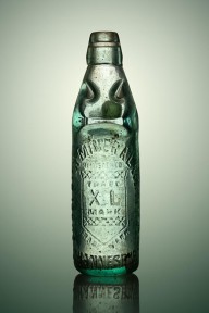 12912058 antique-mineral-glass-bottle-johan-swanepoel