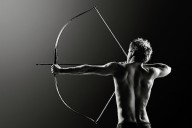 25024364 male-archer-drawing-long-bow-johan-swanepoel